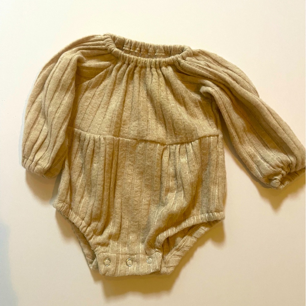 Cream long sleeve baby romper. 0-3 months